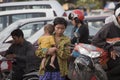 Mother with child in Phnom Penh, Cambodia